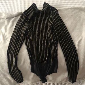 Black and gold bodysuit